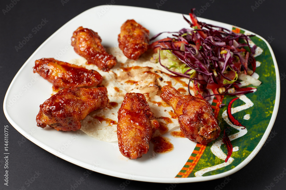 Chicken wings in Mexican style. Mexican food. Mexican cuisine.
