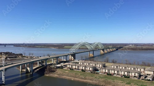 Pan of Mississippi River from Arkansas to Memphis, Tennessee, along Interstate 40.