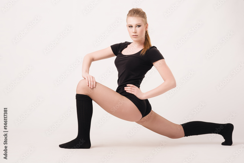 Plasticity. A girl performs an exercise on flexibility. Plasticity. A girl performs an exercise on flexibility.