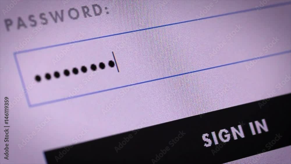 Login web page closeup. Entering password and clicking the button sign in on computer screen Login web page closeup. Entering password and clicking the button sign in on computer screen