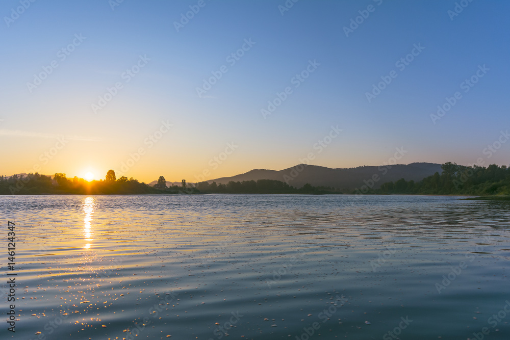 Summer river landscape with sunrise