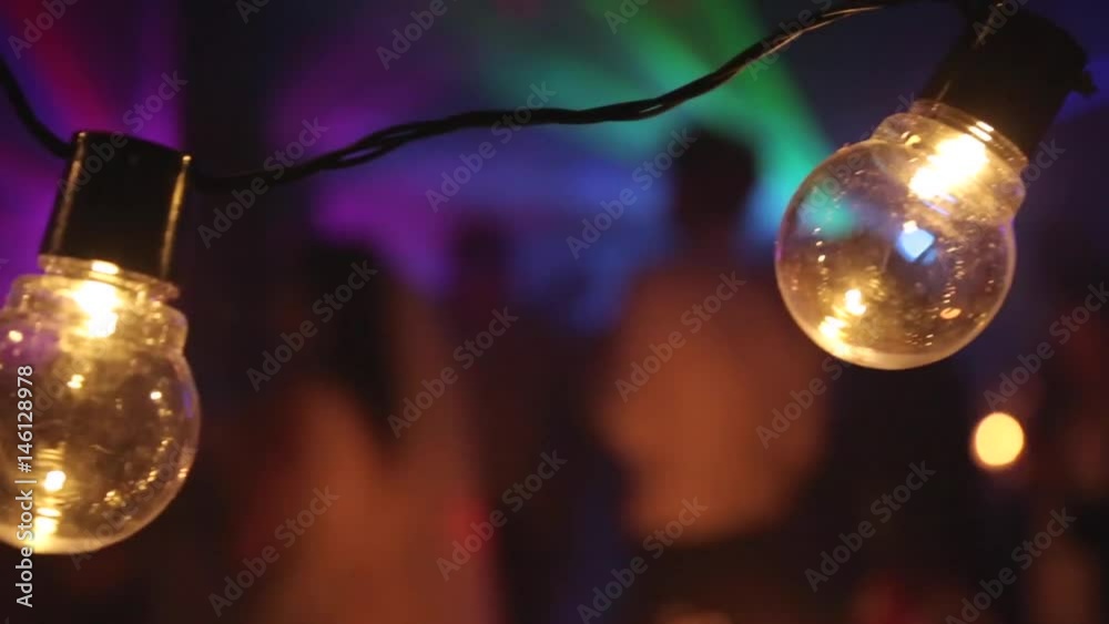 A light bulb at the party. A light bulb at the party.