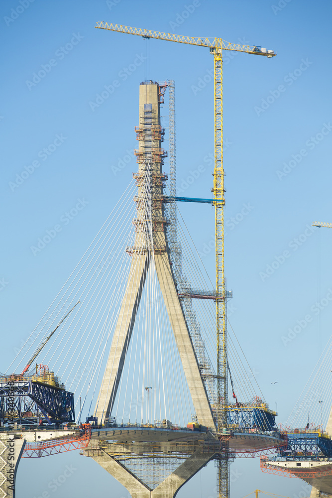 Construction of big guyed bridge in Cádiz over the sea Construction of big guyed bridge in Cádiz over the sea