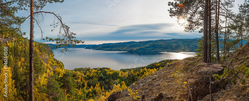 Panoramic view of norwegian fjord and autumn forests from above photo