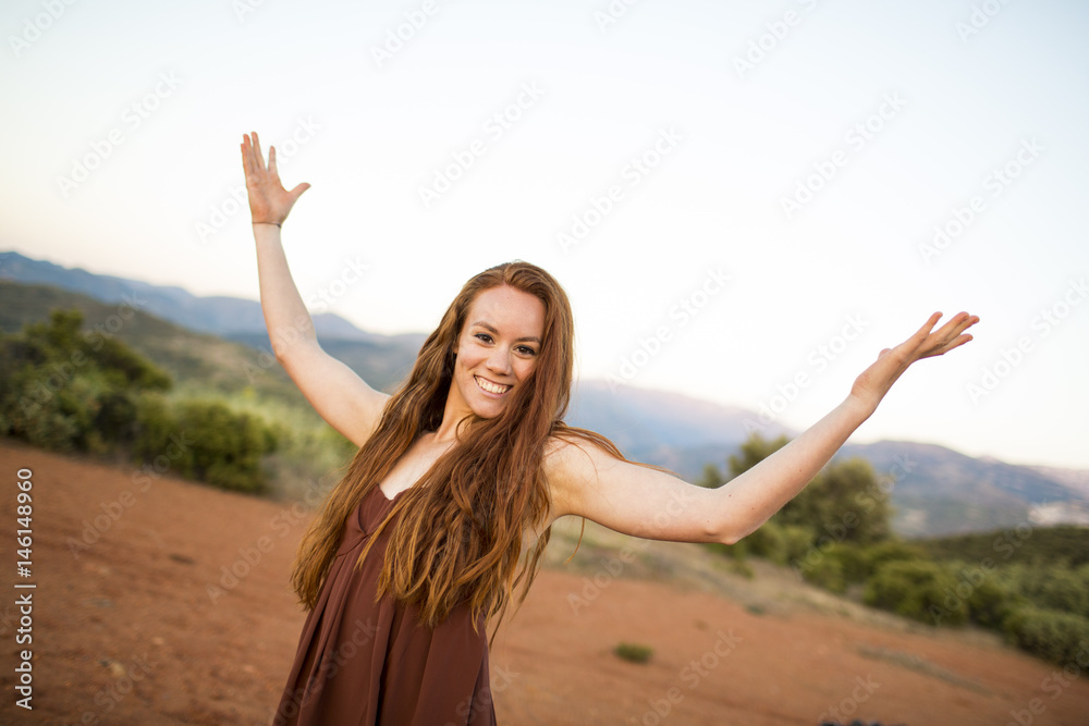Beautiful brunette lady in wheat field at sunset Beautiful brunette lady in wheat field at sunset