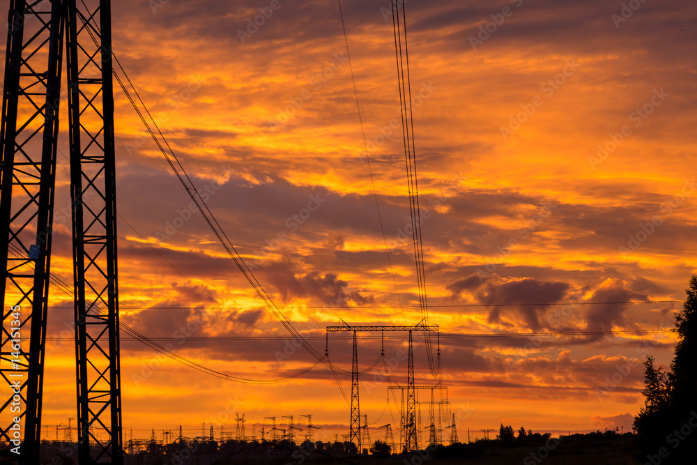Power line support against a fantastic sky background