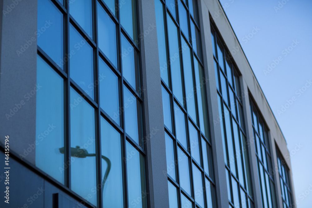Office buildings in cityscape with a sky blue Office buildings in cityscape with a sky blue