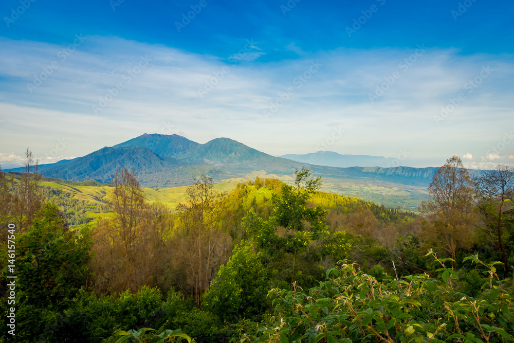 KAWEH IJEN, INDONESIA: Beautiful shot of high altitude landscape with green mountains in the distance