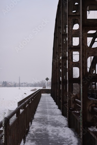 Railbridge across the river Labe, Hradec Kralove, Czech republic photo