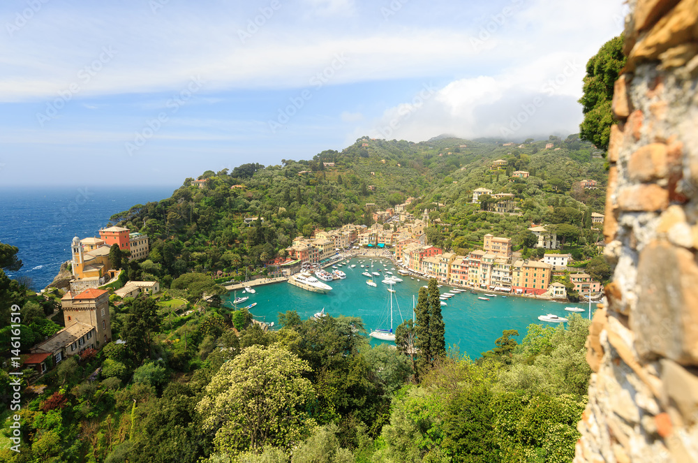 Beautiful sea from Castle with colorful houses in Portofino, Italy