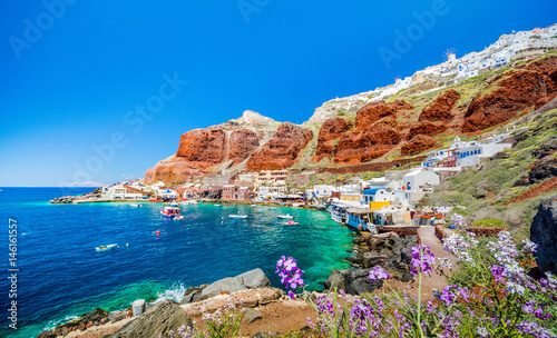 The old harbor of Ammoudi under the famous village of Ia at Santorini, Greece.
