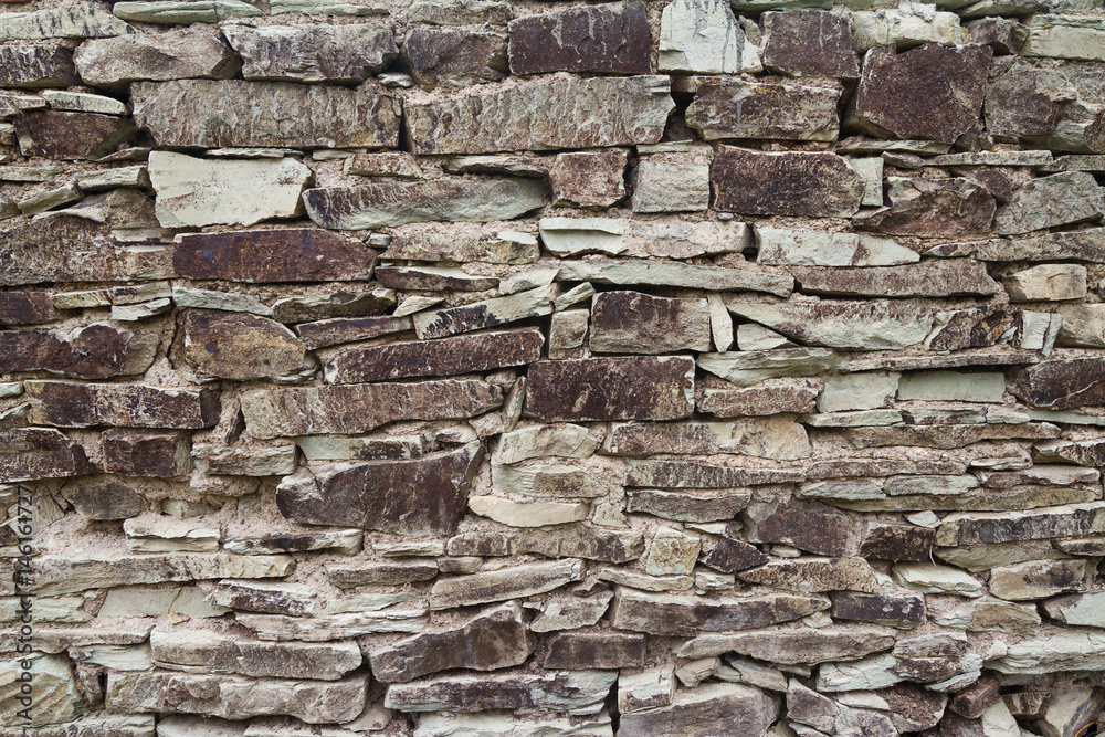 Fototapeta premium wall made of river stones