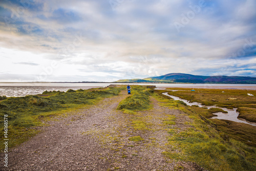 Photo of the lake and on the coast walk people