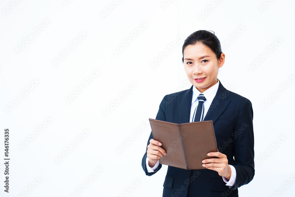 Smart business woman is holding files in her hand Smart business woman is holding files in her hand