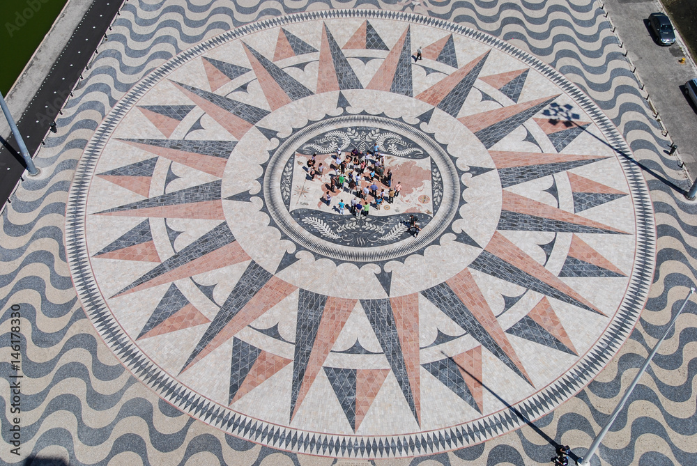 Aerial view of the world map mosaic with people standing in the middle, Lisbon, Portugal