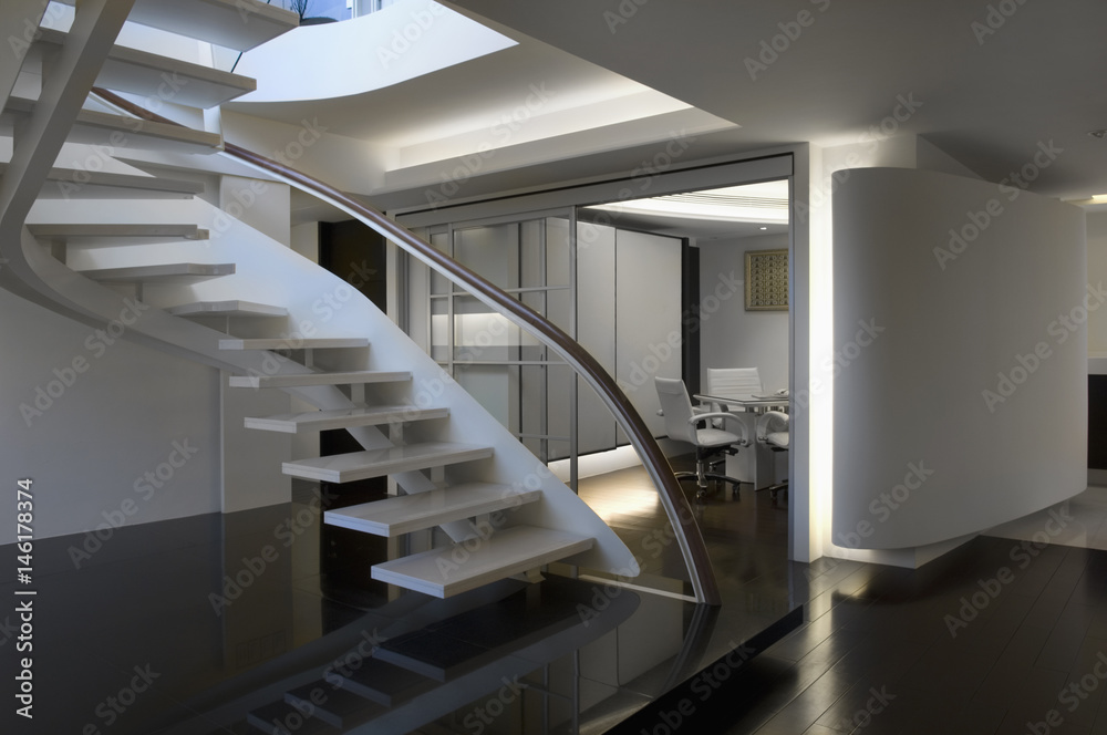 Modern white staircase with glass banister Modern white staircase with glass banister