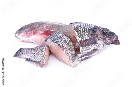 Canvas Print whole and portion cut fresh Nile Tilapia fish on white background
