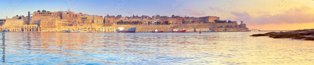 Malta, Valletta with its traditional architecture on asunrise, panoramic image