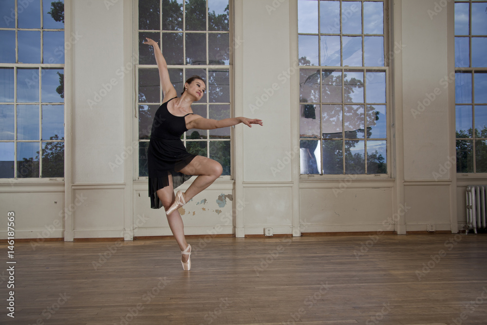 Asian ballerina dancing in studio Asian ballerina dancing in studio