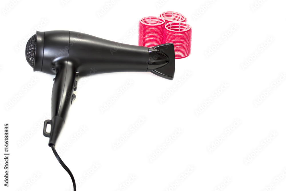 Hair dryer and curlers for large curls, isolated Hair dryer and curlers for large curls, isolated