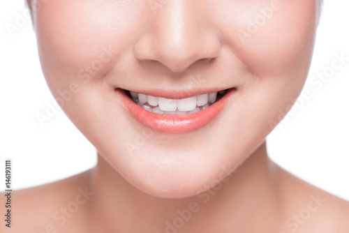 Close up of smile of young asian woman with great healthy white teeth