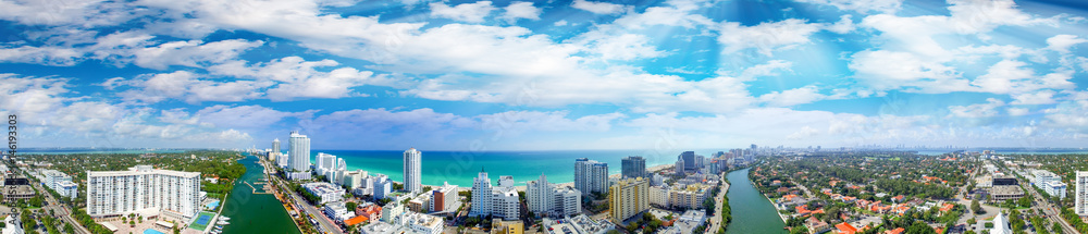 Miami Beach buildings and coastline - Panoramic aerial view at sunset