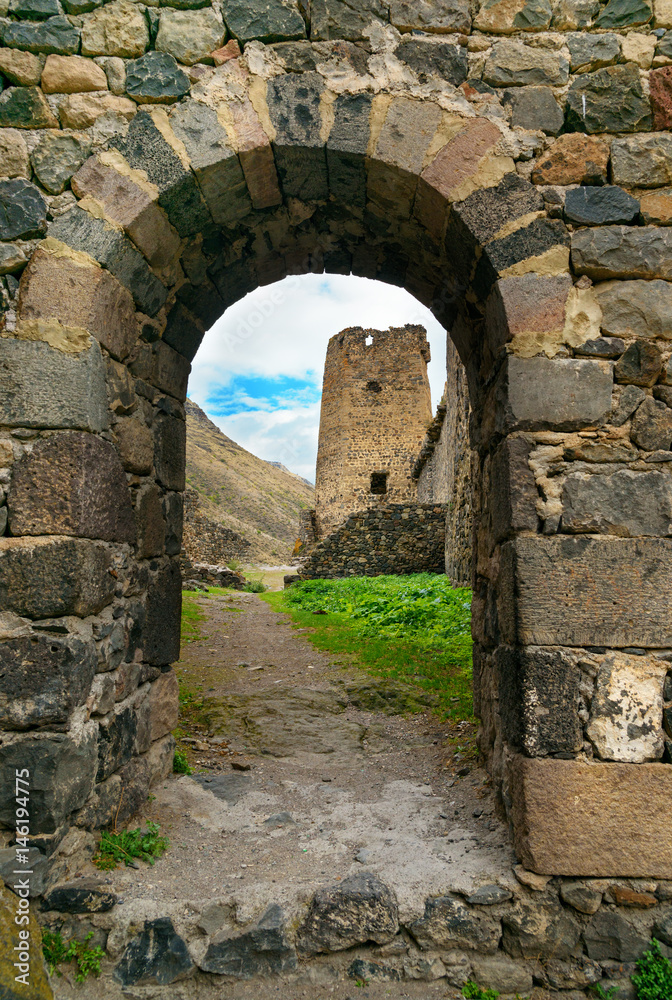 View through arch. Khertvisi fortress on mountain. Georgia