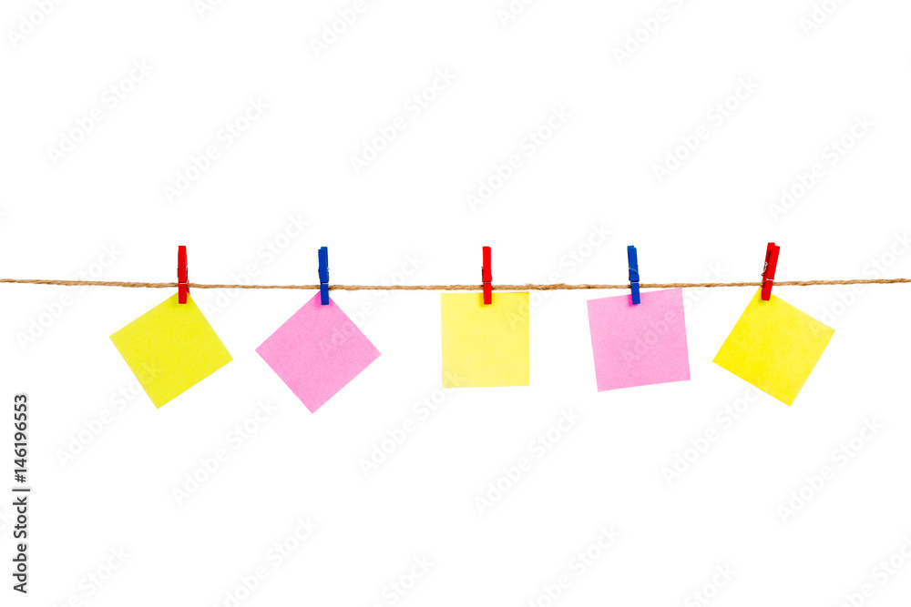 colorful paper. Hanging with clothespins on white background colorful paper. Hanging with clothespins on white background