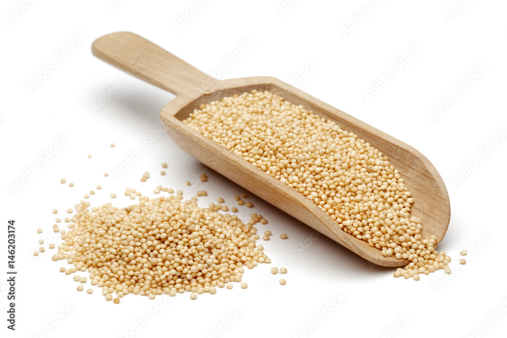 Amaranth grains in wooden scoop Amaranth grains in wooden scoop