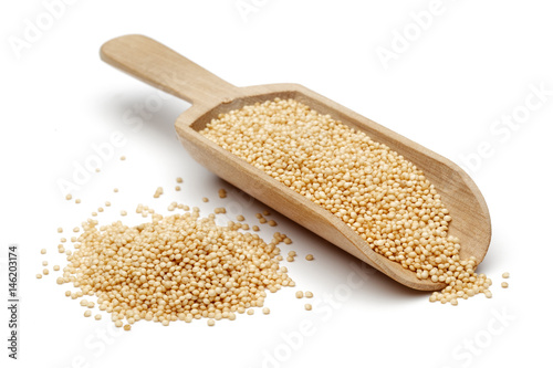 Amaranth grains in wooden scoop