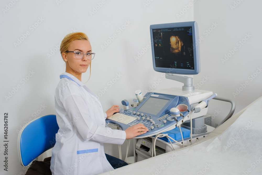 doctor working at ultrasound diagnostic machine doctor working at ultrasound diagnostic machine
