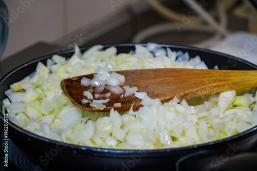 Fried onion in pan