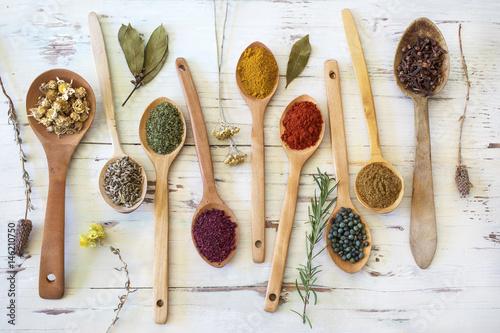 Fototapeta Naklejka Na Ścianę i Meble -  Spices and herbs on wooden background