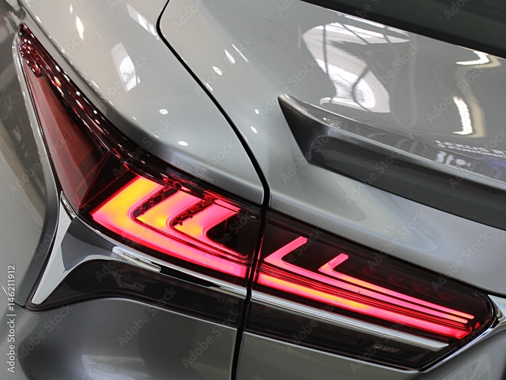 Detail of elegant shape of rear lights on modern japanese exclusive hybrid car