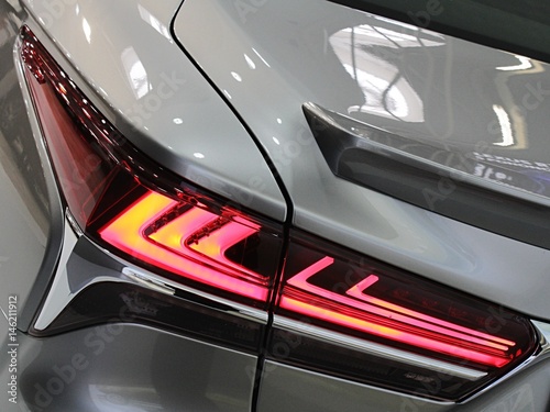 Detail of elegant shape of rear lights on modern japanese exclusive hybrid car
