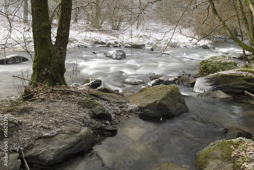 Cold winter landscape of the Houille river in the Belgian Ardennes