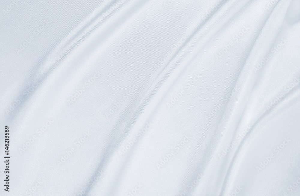 Smooth elegant grey silk or satin luxury cloth as wedding background. Luxurious background design