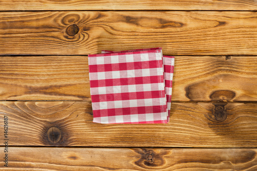 Background with empty wooden table with tablecloth