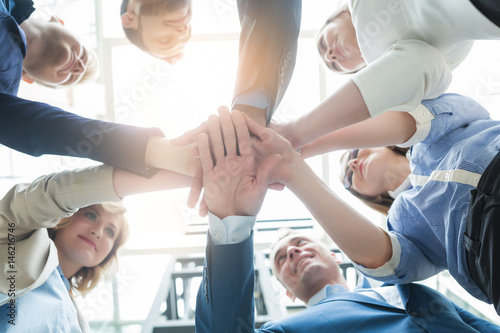 business people teamwork stacking hand together