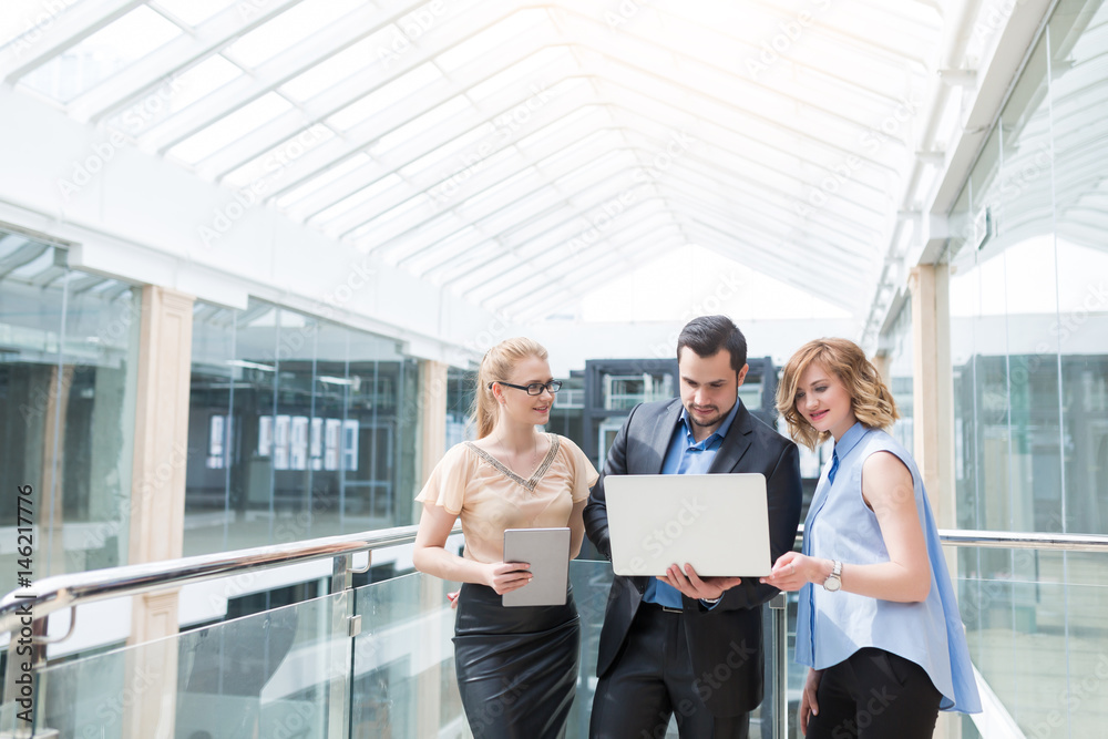 Business team, businesspeople group at modern bright office interior Business team, businesspeople group at modern bright office interior