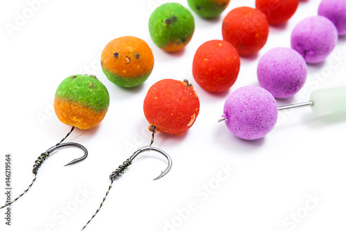 Carp fishing. Different of carp boilies and accessories for carp fishing isolated on white background. photo