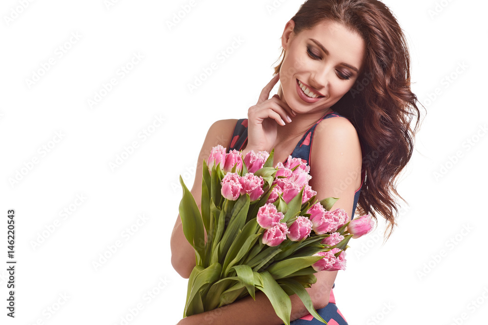 Sexy young woman with flowers. Attractive model with bouquet of tulips Sexy young woman with flowers. Attractive model with bouquet of tulips