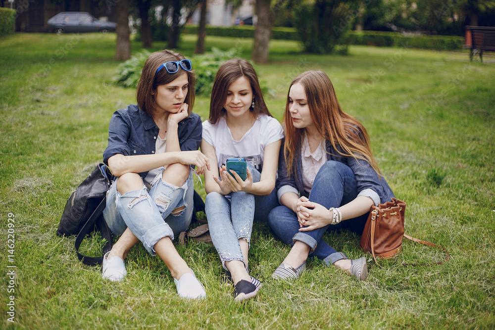 Fototapeta premium three beautiful girls on walk