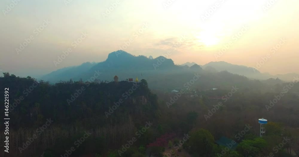 
Stunning panoramic view on wat Tha Kha Nun.sunshine through the sky above the high mountain