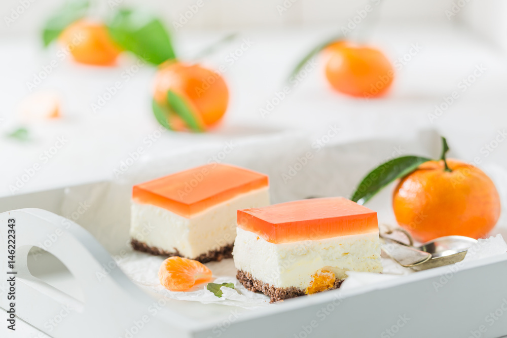 Homemade cheesecake with fresh mandarin and jelly Homemade cheesecake with fresh mandarin and jelly