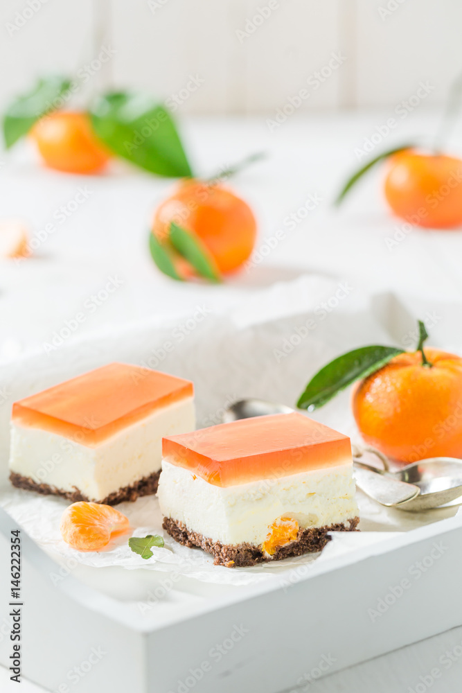 Tasty cheesecake with fresh mandarin and jelly Tasty cheesecake with fresh mandarin and jelly