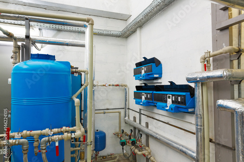 Modern water treatment system with automatic control units in industrial gas boiler house