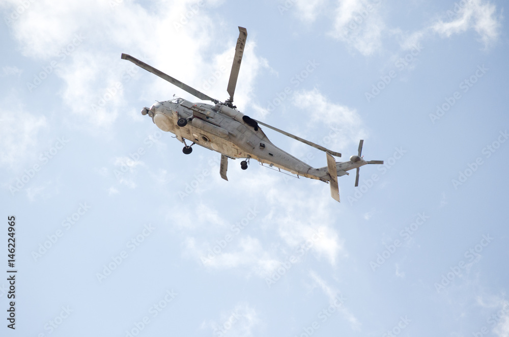 Black hawk helicopter rescue team,left down side view Black hawk helicopter rescue team,left down side view