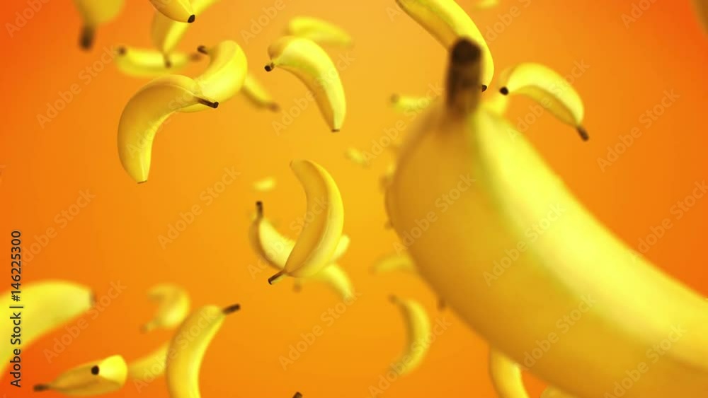 CGI 3D animation of yellow bananas floating against orange background 