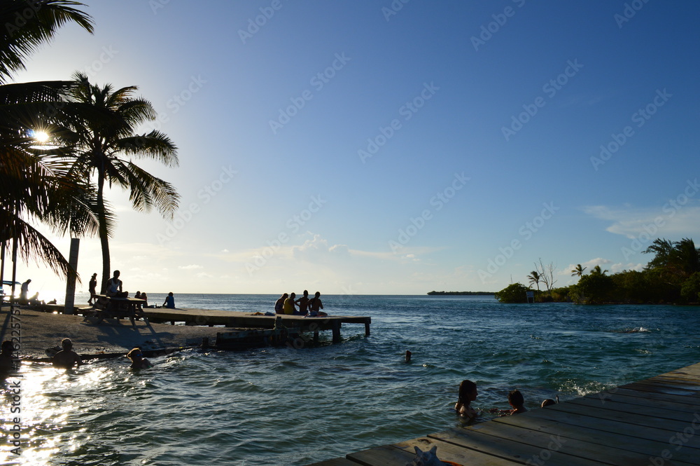 People Enjoying a Caribbean Sunset on a Little Boat, Split, Caye Caulker, Belize